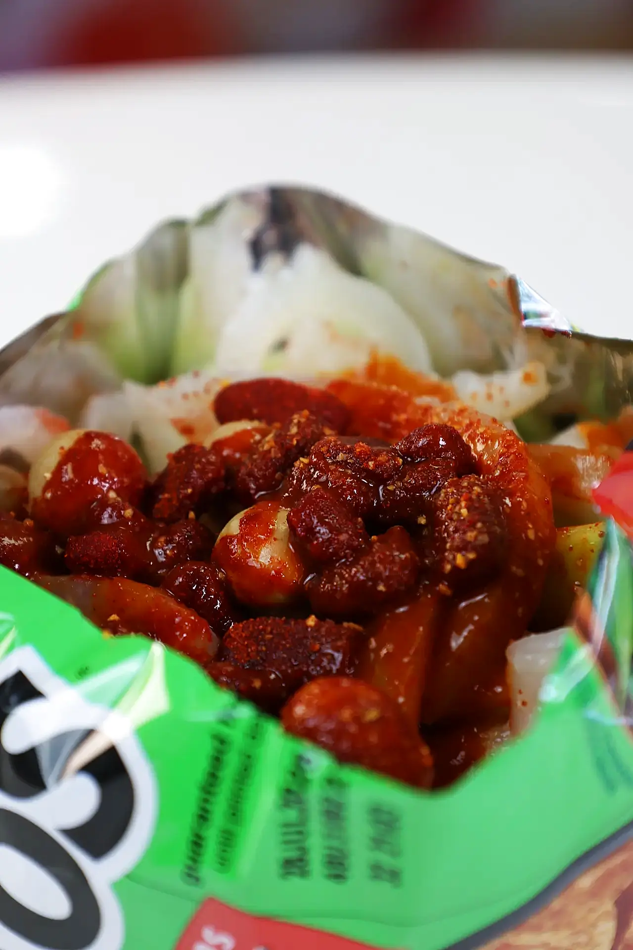 Tostilocos preparados con chamoy